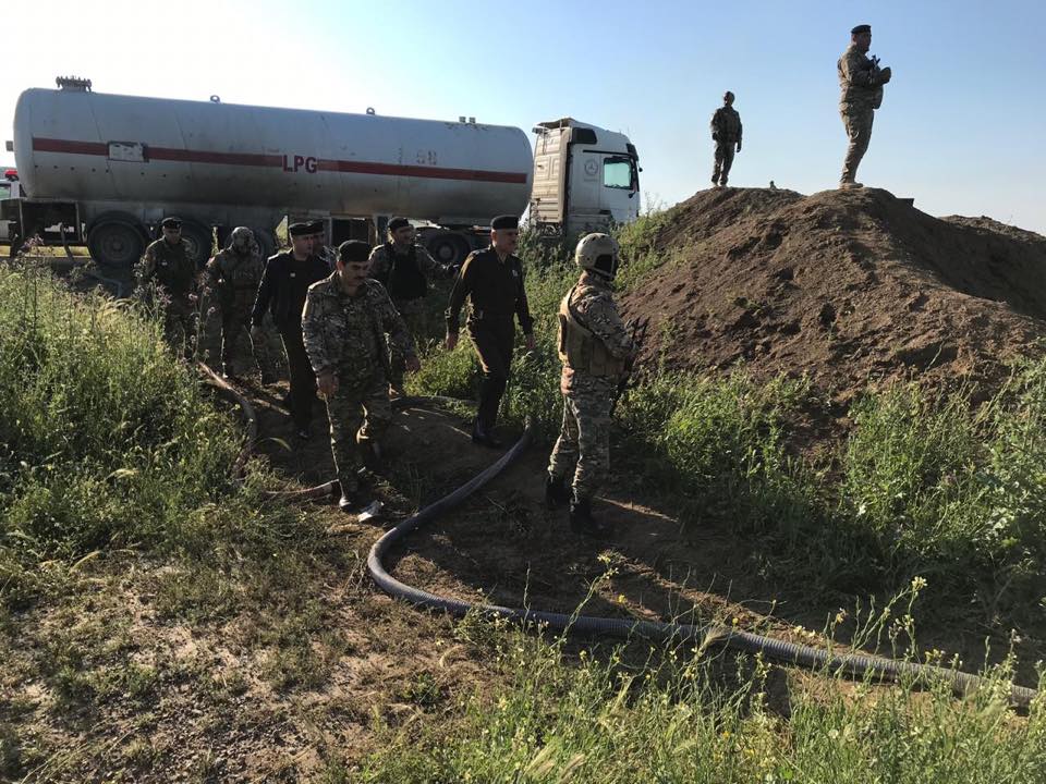 Police forces in Kirkuk confiscate two trucks in the site of an oil robbing, April 18, 2019. (Photo: Energy Police in Kirkuk)
